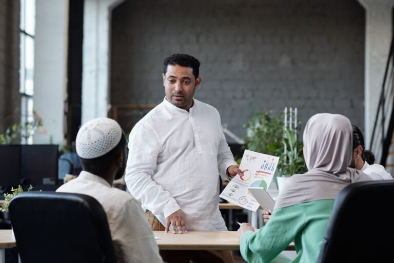 Confident Businessman With Financial Paper Looking ZWVQ27J 768x513